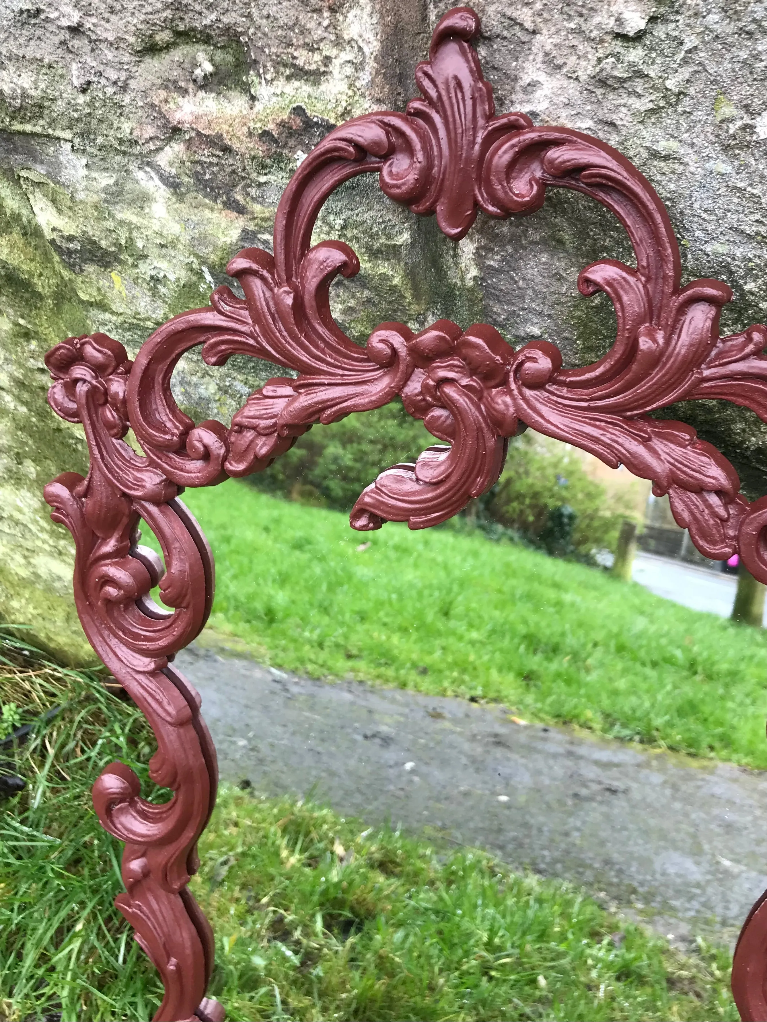Ornate reproduction vintage plastic moulded  mirror painted in a deep dark burgundy